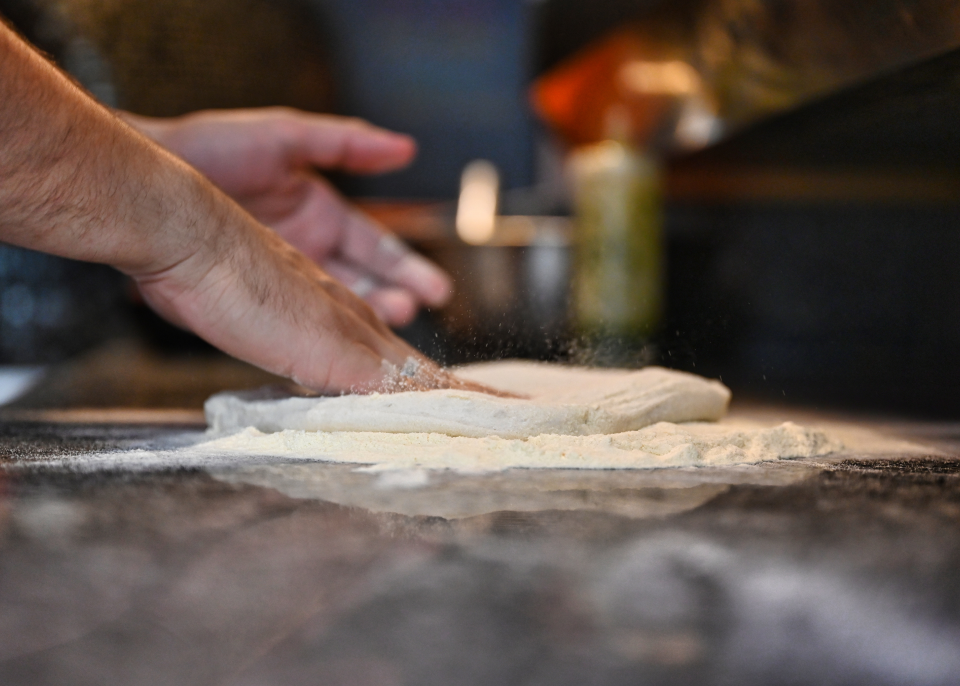 Casa Vostra - Our Story Photo - Chef Opening Pizza Casa Vostra - Our Story Photo - Chef Opening Pizza